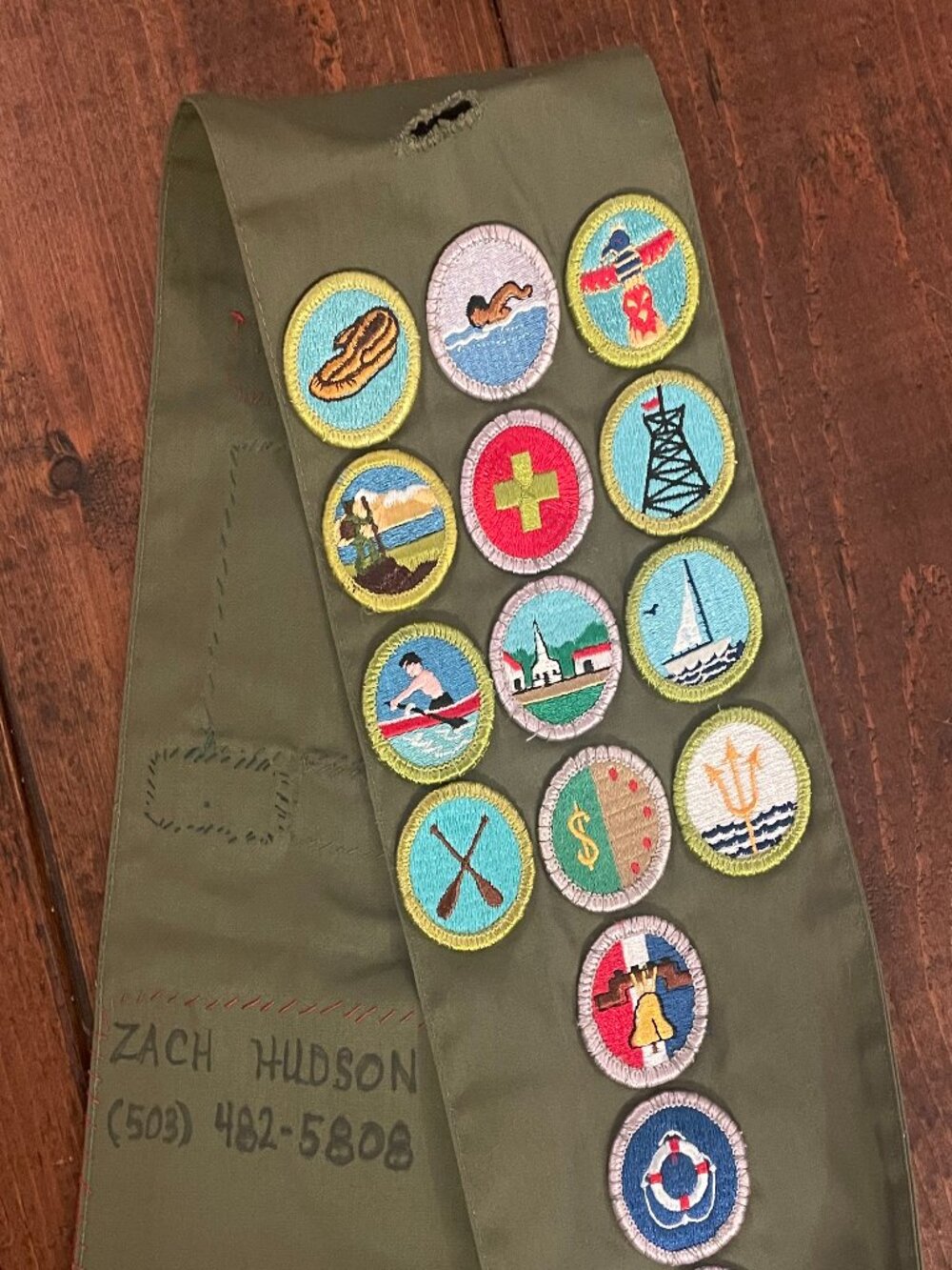Boy Scouts of America merit badge sash with badges 1990s